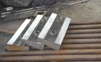 Peças altas de pedra PF1315 do desgaste do triturador de impacto do martelo das peças sobresselentes CI231 Chrome do triturador Cr26, peças do triturador do trio
